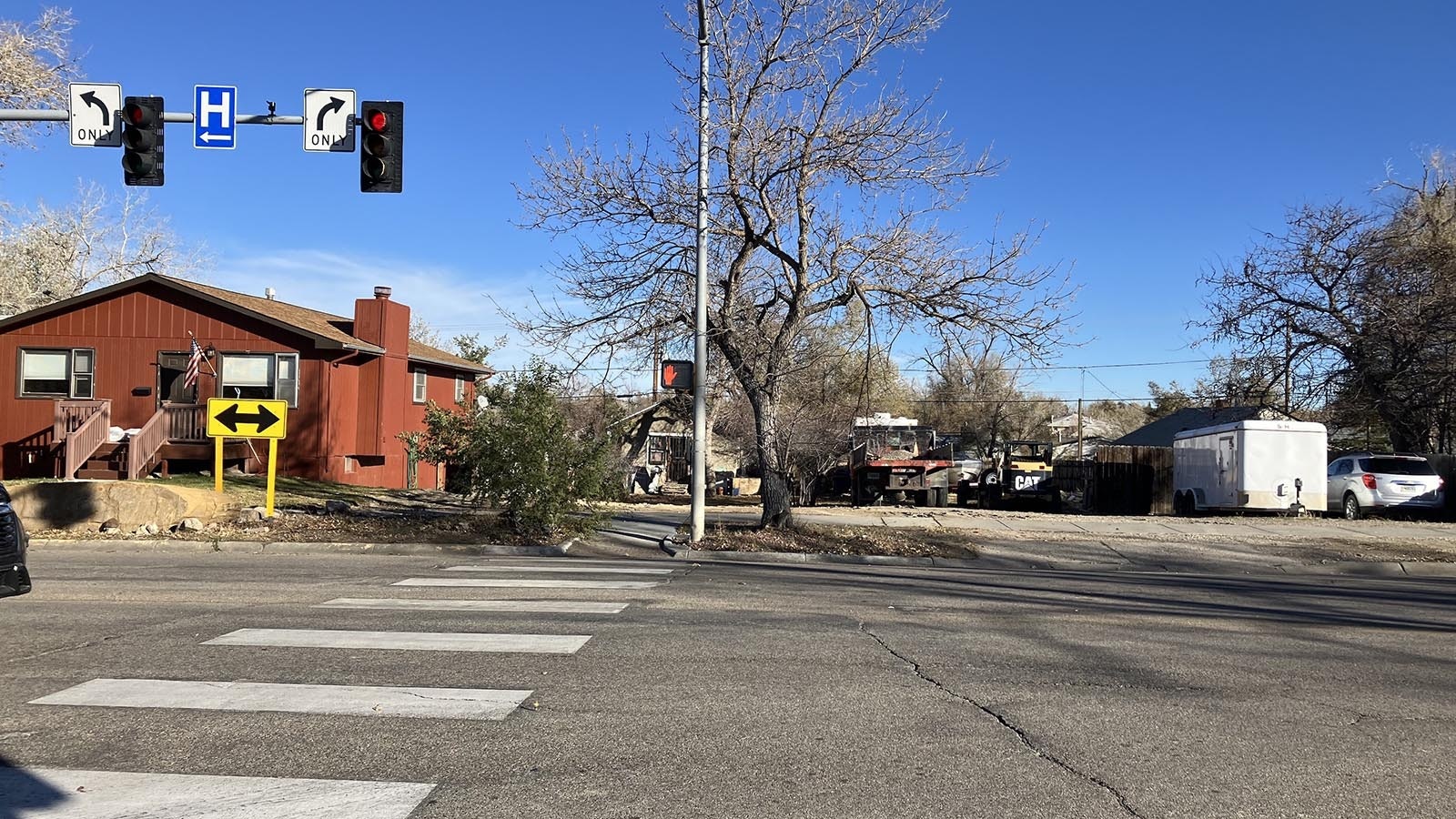 The intersection of 13th Street and McKinley now has one less house for drivers to hit. Now there's a vacant lot to the right where a house had been that was hit several times with vehicles.