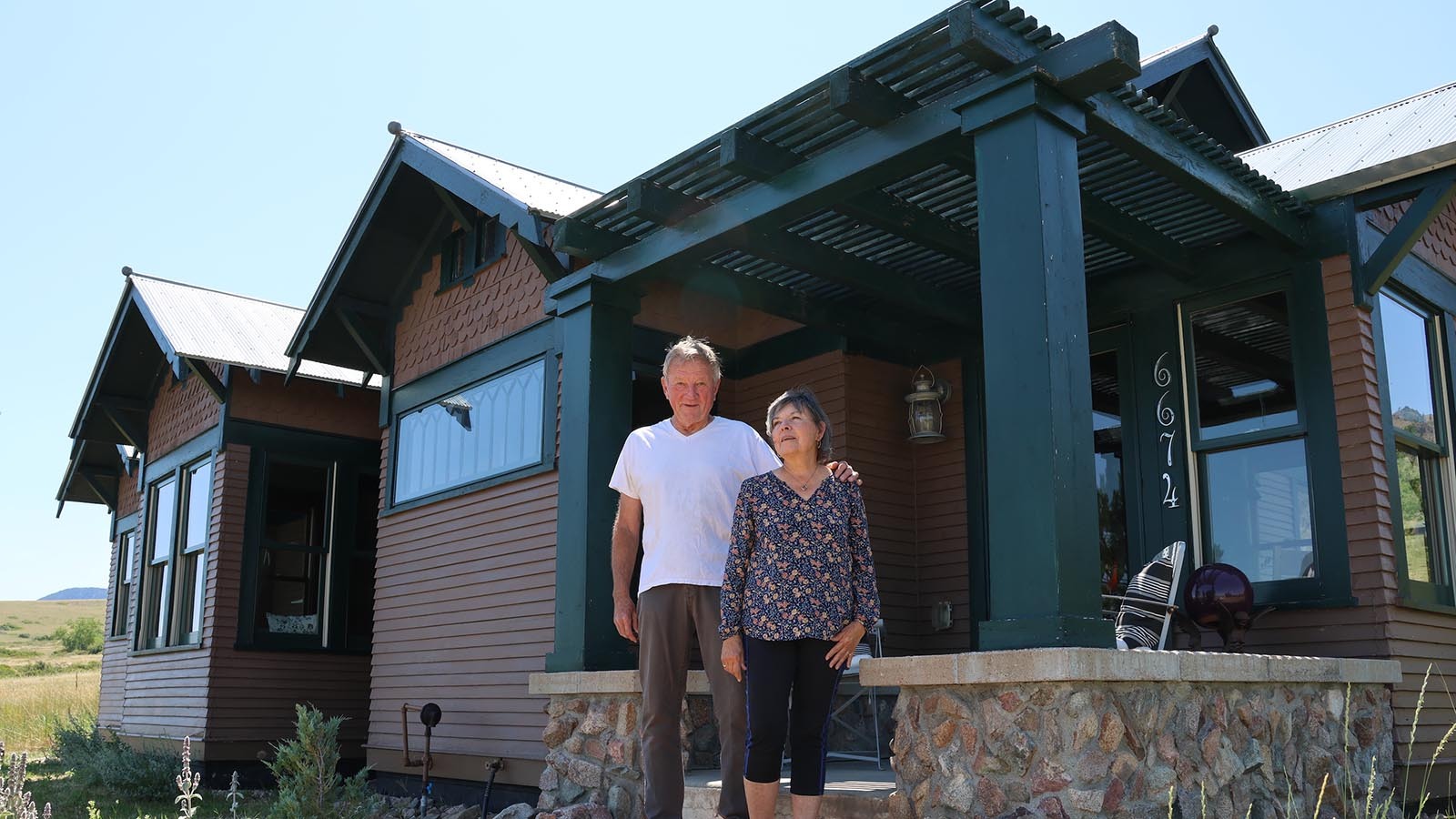 Walter and Sharon Merschat have restored the exterior of the home that includes gingerbread-style siding at the top. Original windows had to be replaced because the mountain winds blew them out during the buildings first winter.