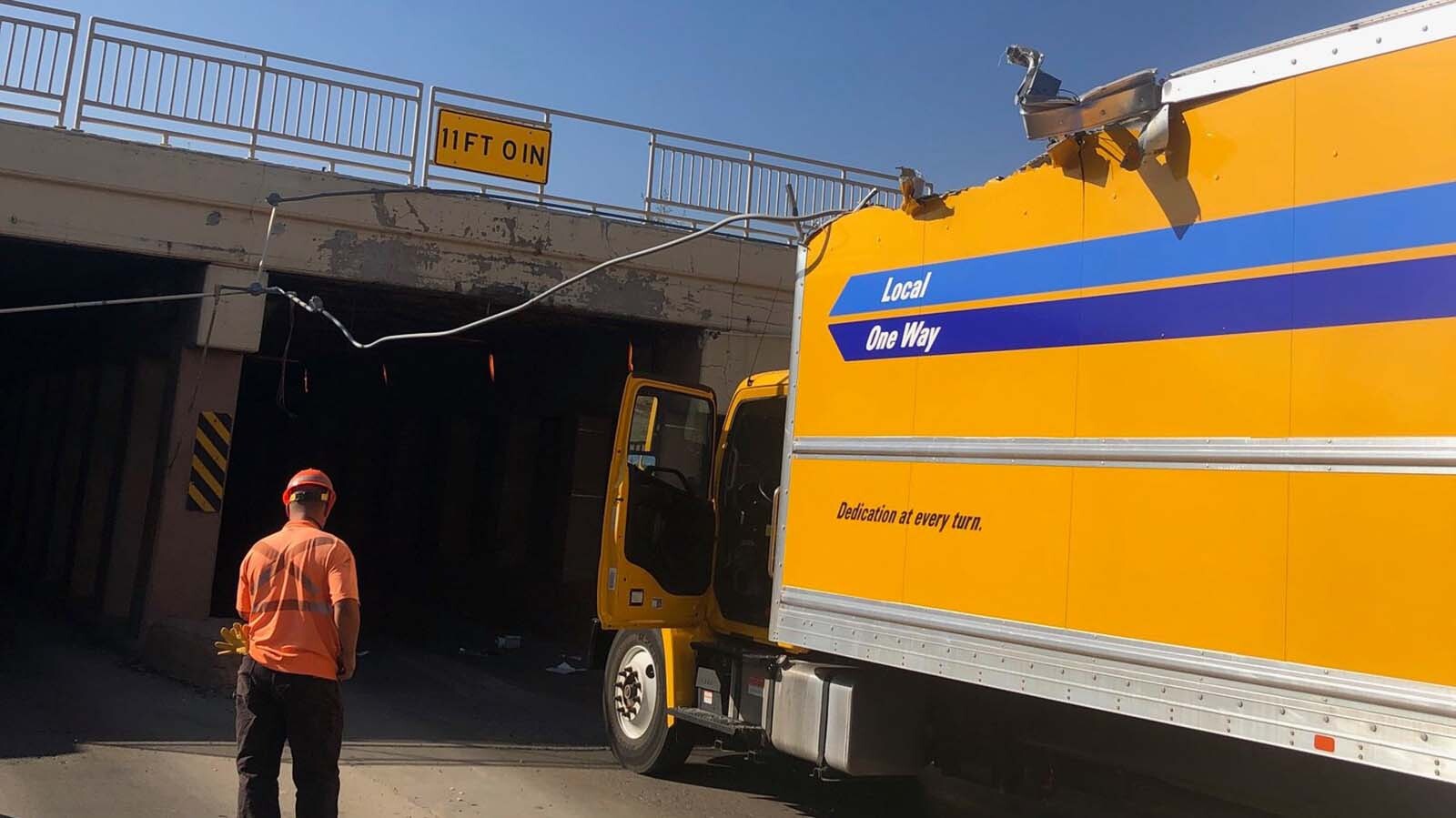 Wyoming transportation officials say drivers are ultimately responsible for making sure their loads fit under overpasses, and liable when they crash into bridges. A veteran trucker says drivers are often unfairly blamed. Above, the McKinley Street overpass in Casper, at just 11 feet of clearance, is notorious for getting hit by large trucks.