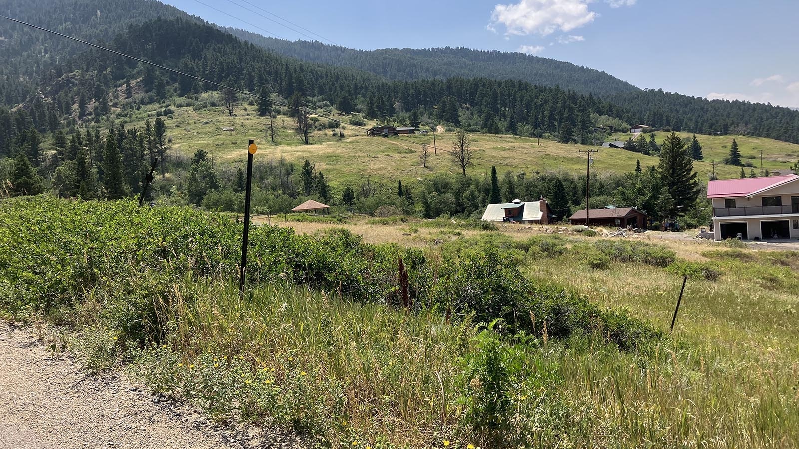 A sharp-eyed real estate agent saved a Casper Mountain landowner from a scammer trying to sell her land out from under her.