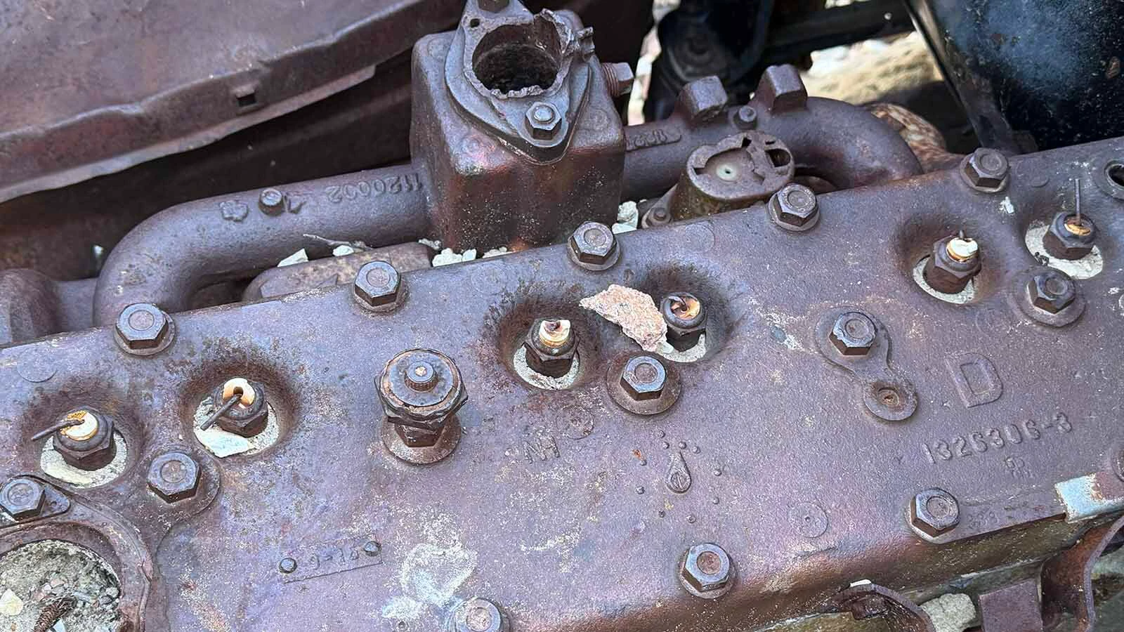 A casting number still visible on the wreck’s engine corresponds to a Dodge 218-cubic-inch flathead-six cylinder head used beginning in the 1940s.