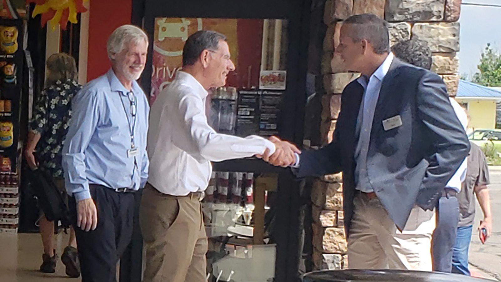 U.S. Sen. John Barrasso, R-Wyoming, shakes hands with Todd Broderick, president of Albertsons Denver Division, outside an Albertsons store in Casper on Tuesday.