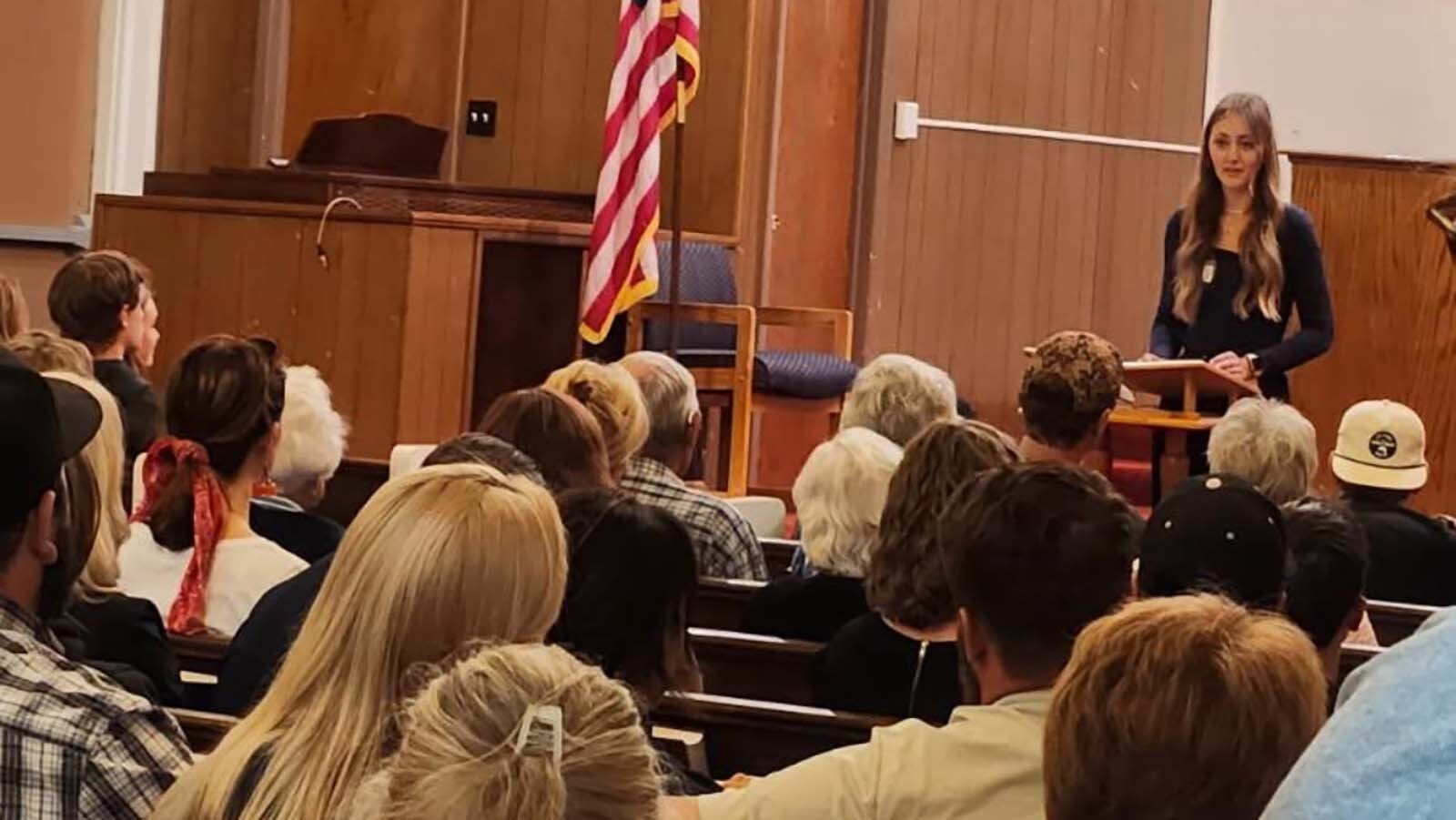 Mya Hager addresses the TPUSA meeting crowd on Tuesday in Casper.
