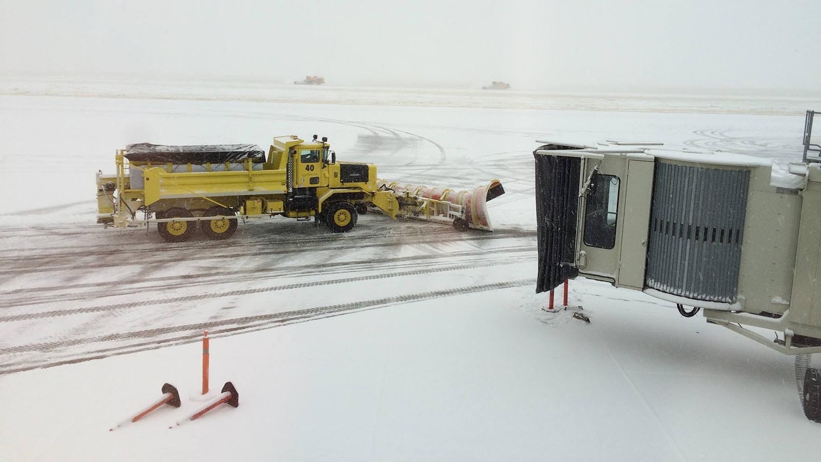 A plow truck clears the tarmac at Casper/Natrona County International Airport in this file photo.