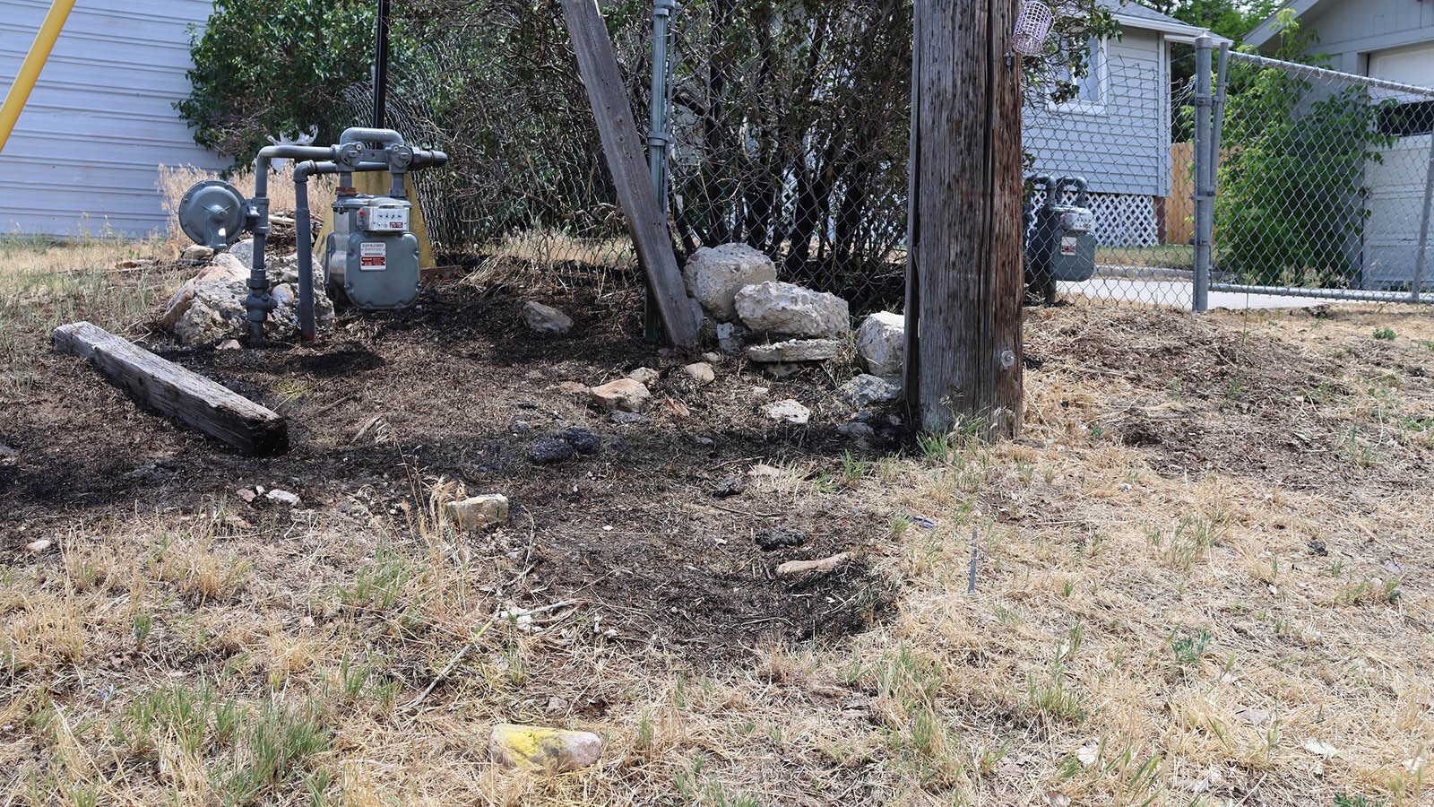 Police are looking for someone who chose an alley behind a fire extinguisher business to try and light grass around a gas main on Thursday.