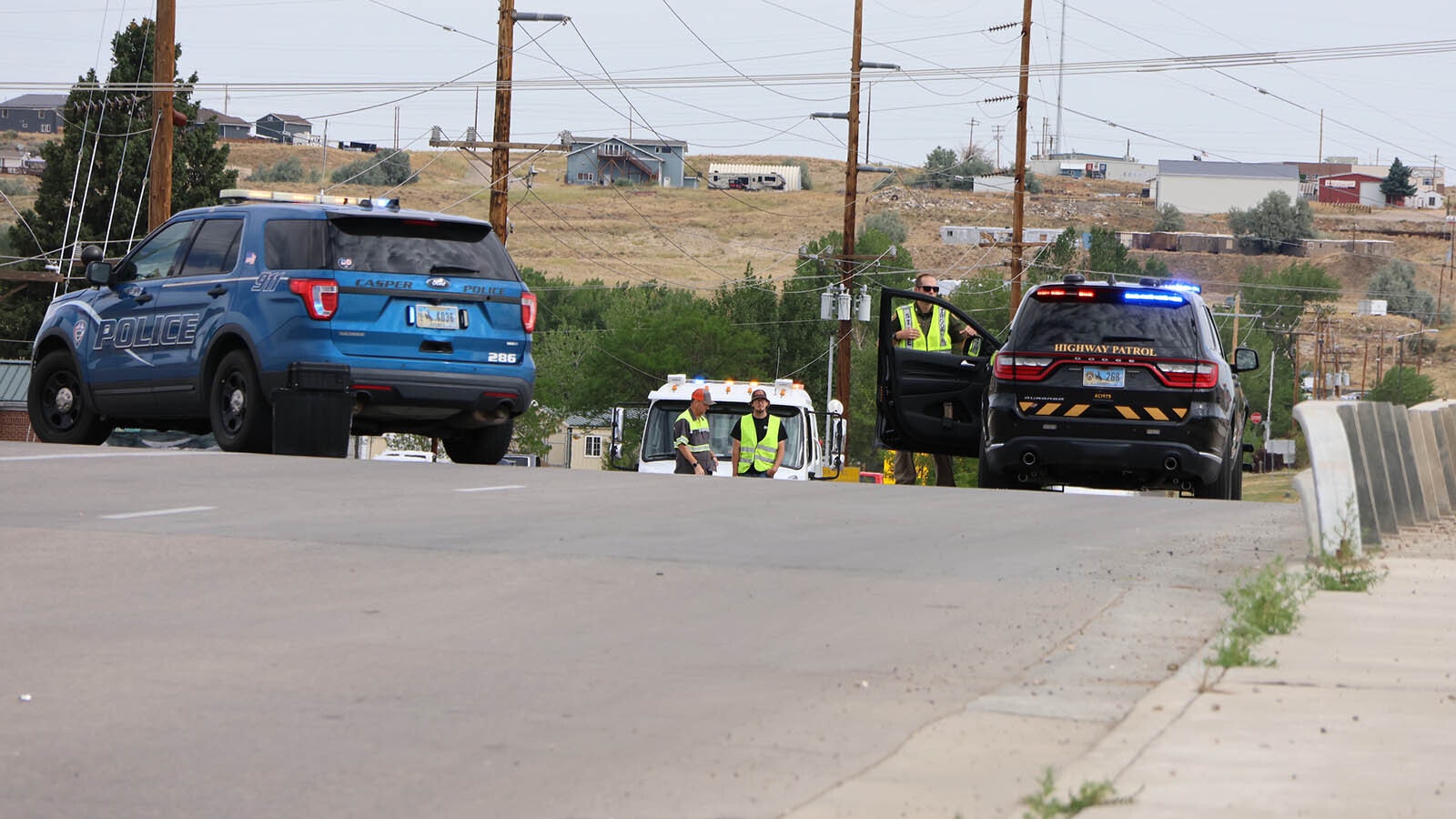 Wyoming Highway Patrol and Casper police block the overpass above Interstate 25 at the Bryan Stock Trail exit and entrance ramp in Casper.