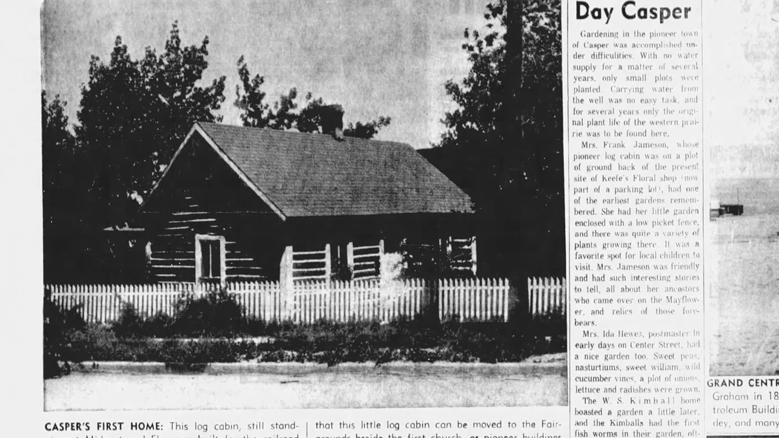 The 1888 cabin is shown as its original location with a white picket fence around it in 1964.