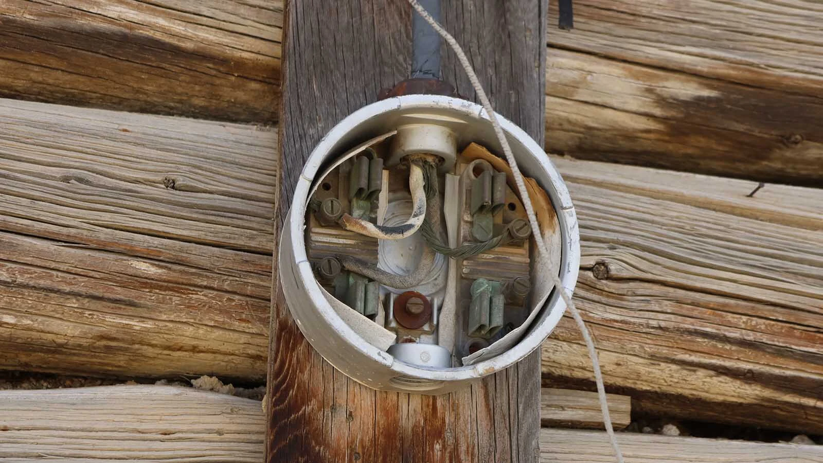 The electrical connection to the 1888 cabin when it was upgraded for electricity back in the early decades of the past century.