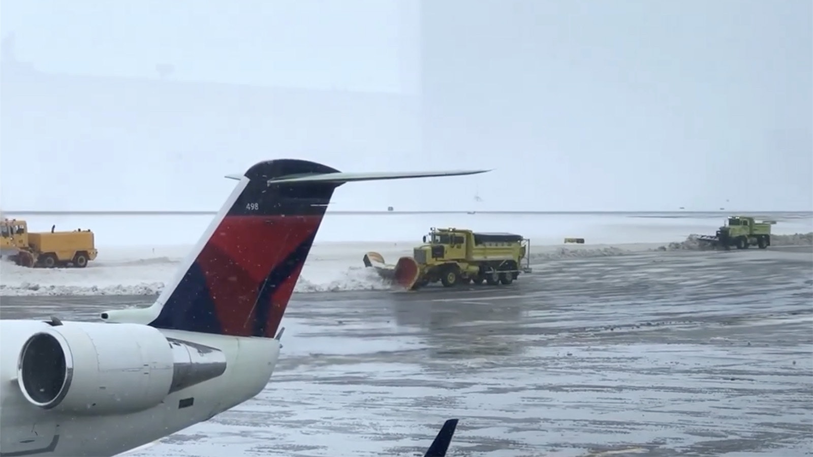 Snow removal teams clear the runways at Casper-Natrona International Airport after a winter snowstorm.