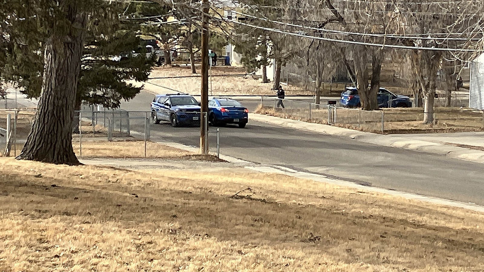 At least three Casper Police Department vehicles and officers remain in the area Feb. 2 after a shooting incident reported the night before.