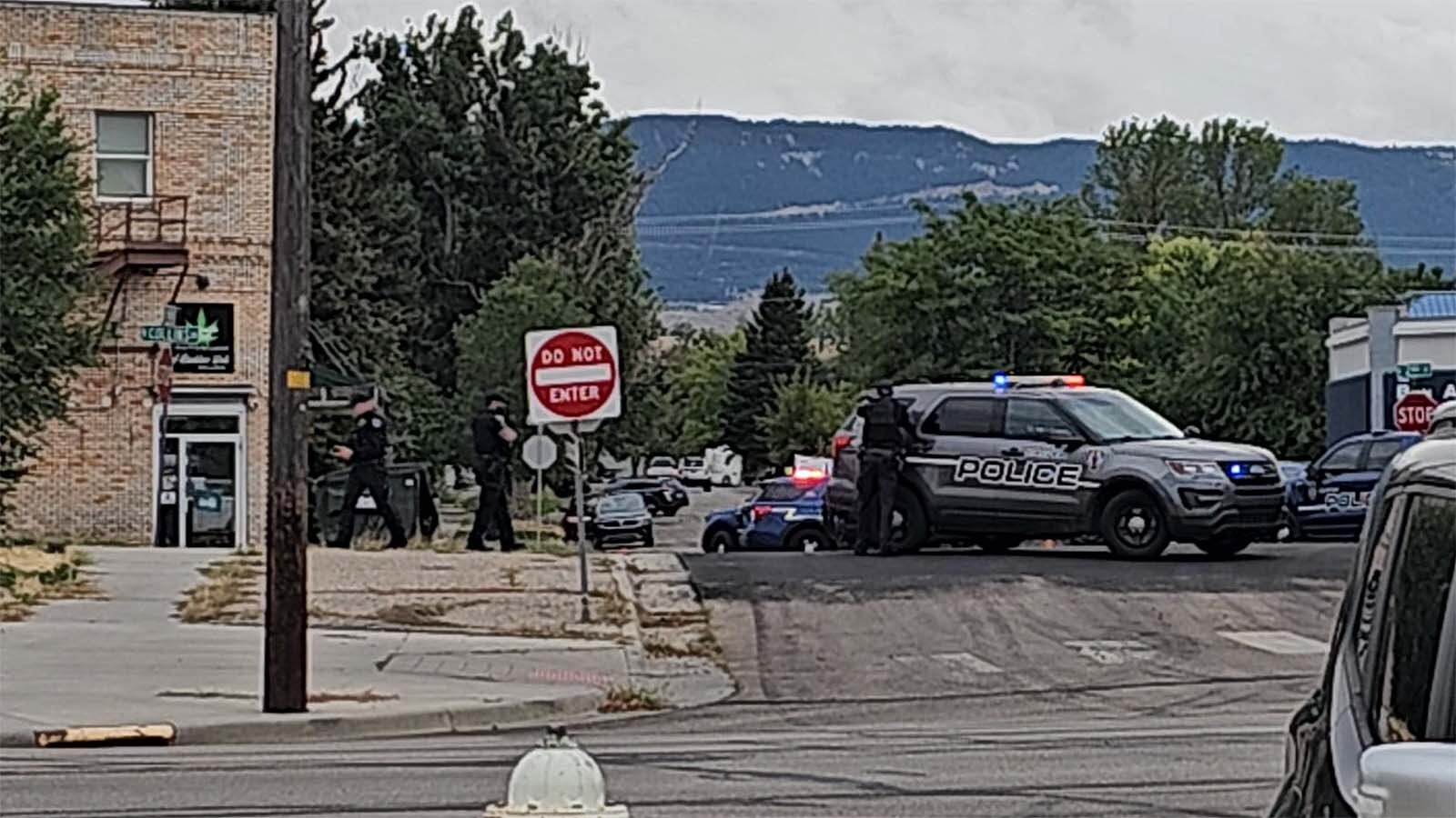 Casper police evacuated a business with apartments above late Wednesday afternoon to arrest a suspect. A woman who said she’s the suspect’s mother said she learned he was wanted on suspicion of homicide.