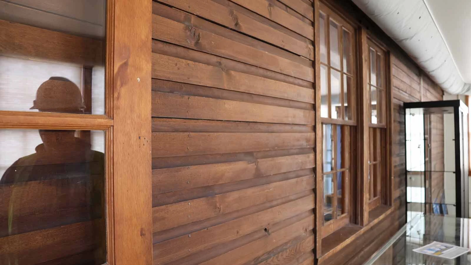 Original siding that was installed on the 1941 serviceman’s club remains in the porch area of the museum.