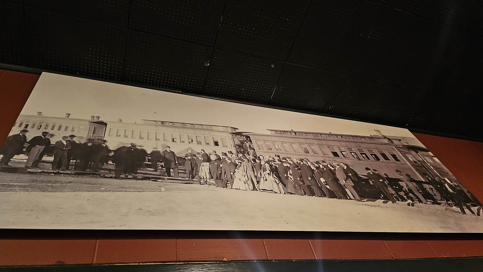 The day the railroad came to town and one of many historical photos hanging on the walls at Cavalryman Steakhouse in Laramie.