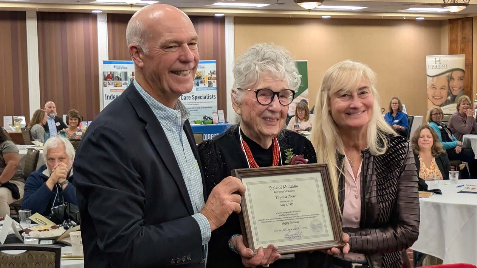 Montana Gov. Greg Gianforte, left, and first lady Susan Gianforte, right, with Virginia Toews of Billings. Toews said the secret to long life is simple: "don't even think about retirement."