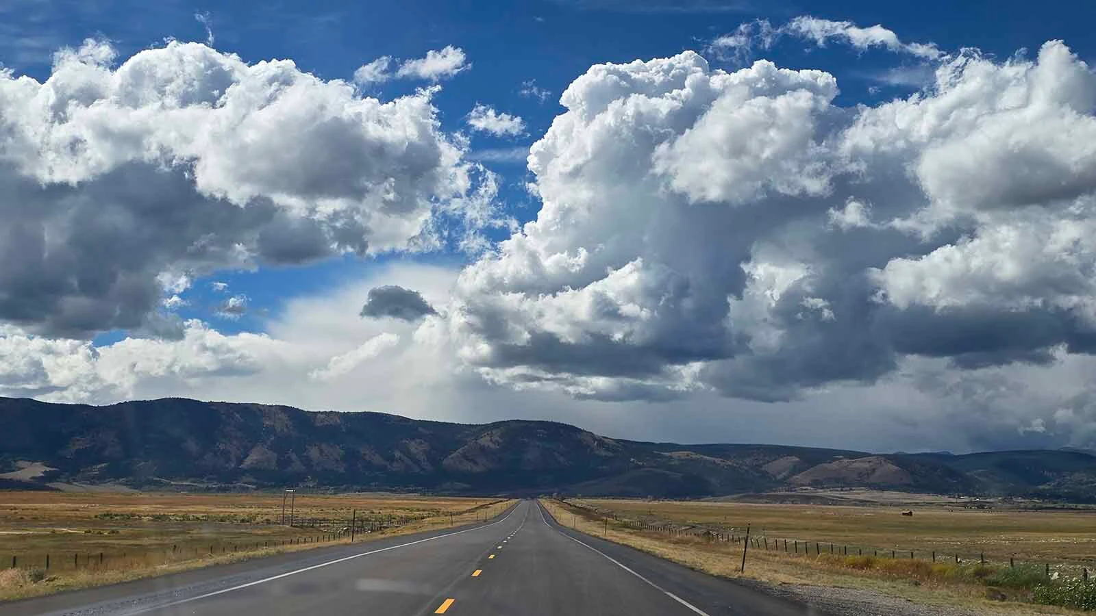 The clouds hang low over the Centennial Valley in the fall. Winter is moving in. It's a signal that winter is moving in soon.