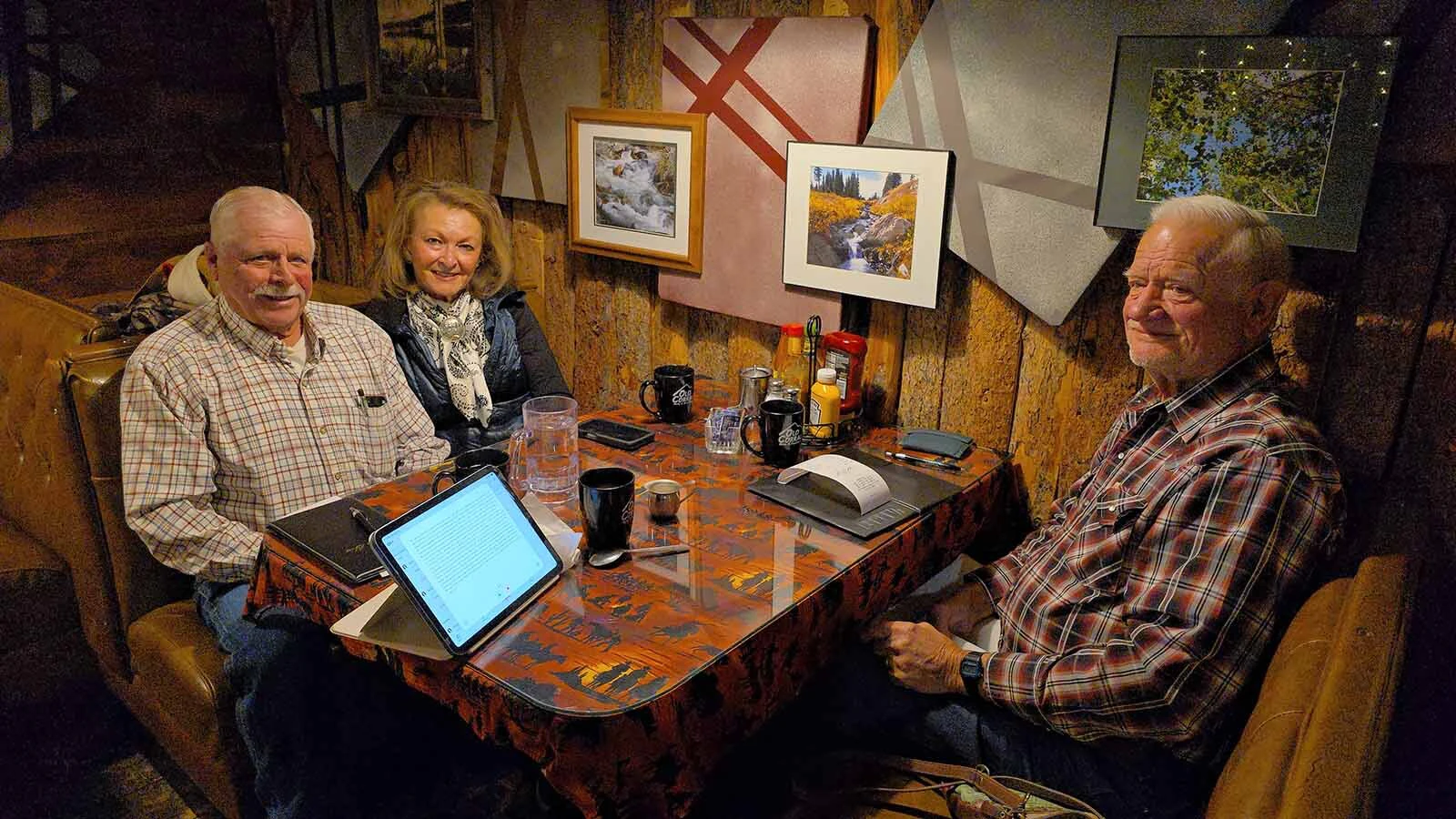 From left, Bill and Vicky Haley and Dick Clifton talk about Centennial today at the Old Corral.