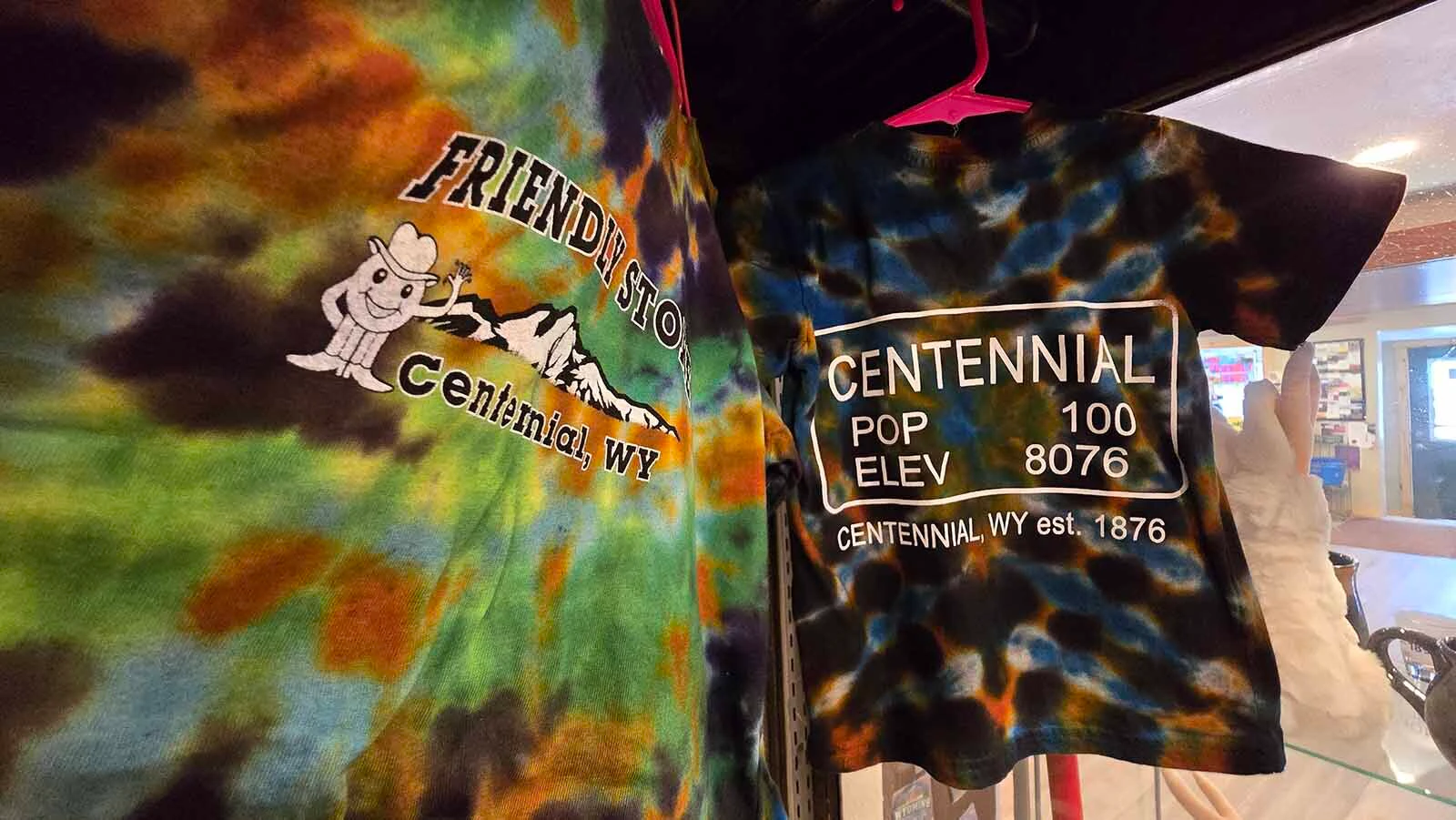 Inside The Friendly Store, a T-shirt that captures Centennial all in one breath: Elevation that exceeds population on a mountain where people aren't afraid to show their colors. (These shirts were not tie-dyed by Kevin Otstot, who calls himself the man who tie-dyed Centennial, but by a former partner.)
