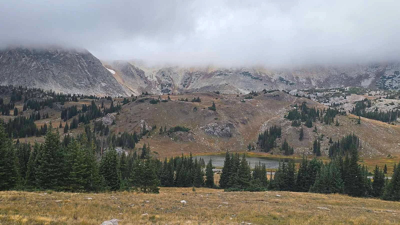 Clouds descend on Medicine Bow Peak as winter prepares to move in. Nearby Centennial is battening down the hatches, getting ready for winter. The small mountain community is celebrating its 150th.