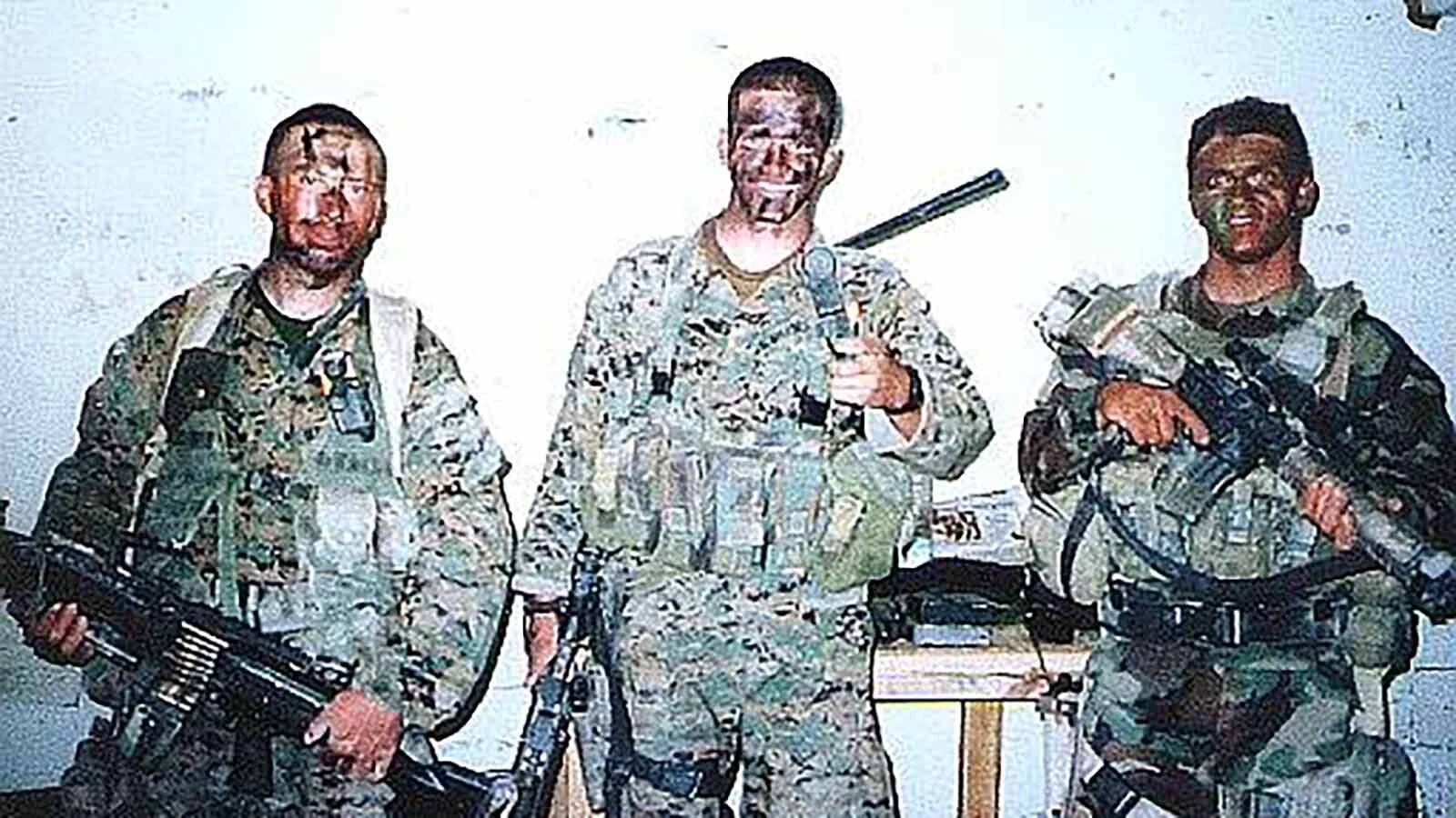 Chad Cassady, center, and fellow Marines in Iraq in 2004 prior to his injuries.