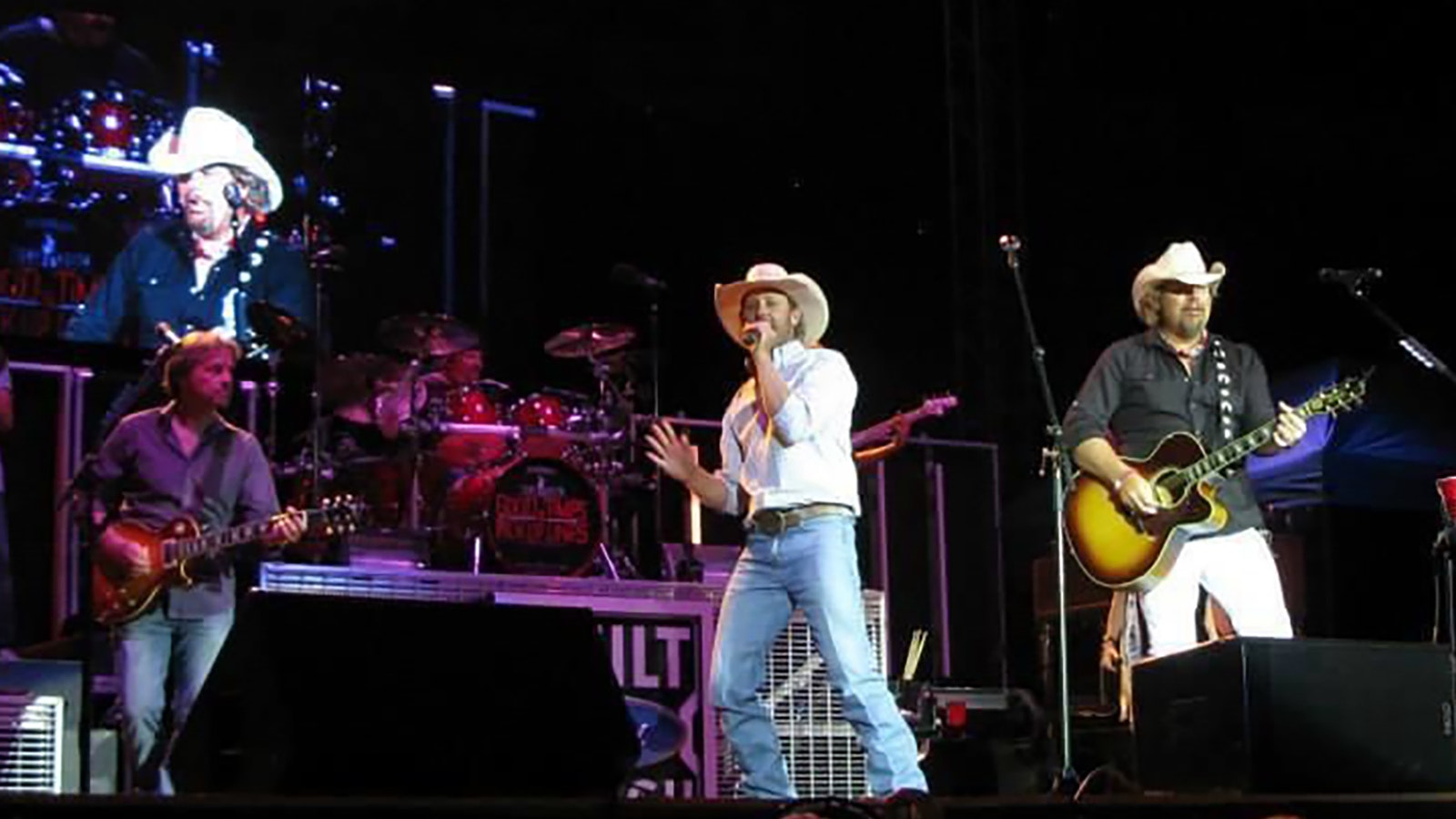 Country music stars Chancey Williams, left, and Toby Keith perform Keith's smash hit "Should've Been a Cowboy" at Cheyenne Frontier Days.