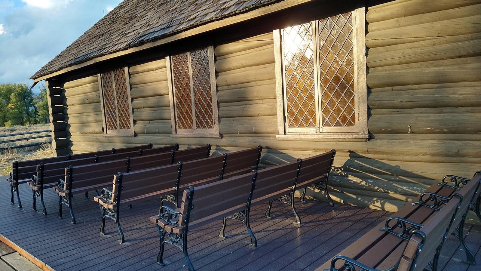 A row of pews outside the Chapel of the Transfiguration.