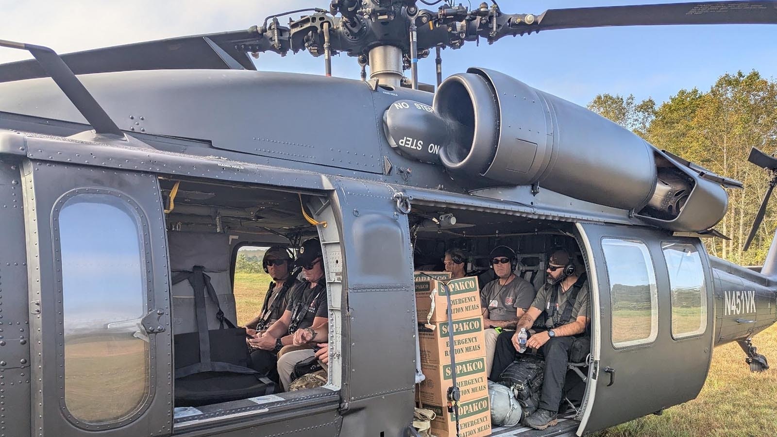 The crew delivered 16 tons of emergency goods in Charles Hoskinson's Black Hawk helicopter.