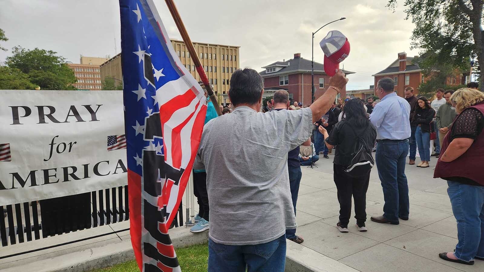 About 100 people gathered at the Wyoming Capitol in Cheyenne on Saturday evening to mourn and honor conservative political influencer Charlie Kirk, who was gunned down Wednesday. They also wept and prayed for Colorado school shooting victims.