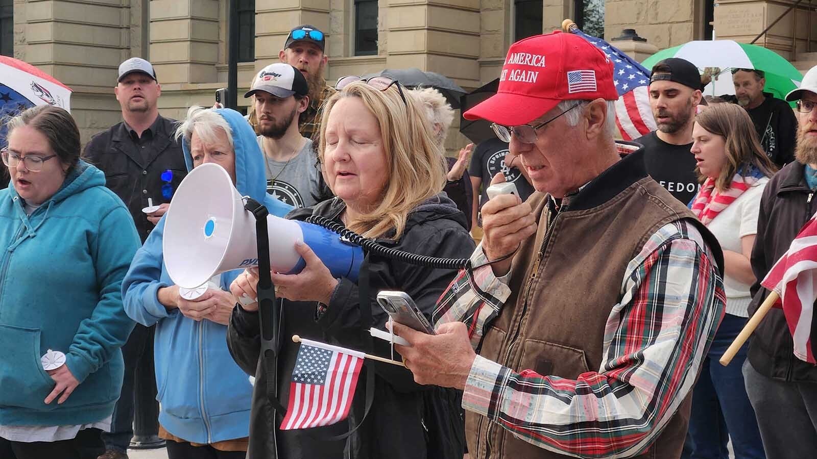 About 100 people gathered at the Wyoming Capitol in Cheyenne on Saturday evening to mourn and honor conservative political influencer Charlie Kirk, who was gunned down Wednesday. They also wept and prayed for Colorado school shooting victims.