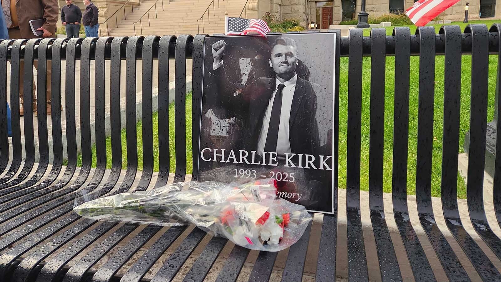 About 100 people gathered at the Wyoming Capitol in Cheyenne on Saturday evening to mourn and honor conservative political influencer Charlie Kirk, who was gunned down Wednesday. They also wept and prayed for Colorado school shooting victims.