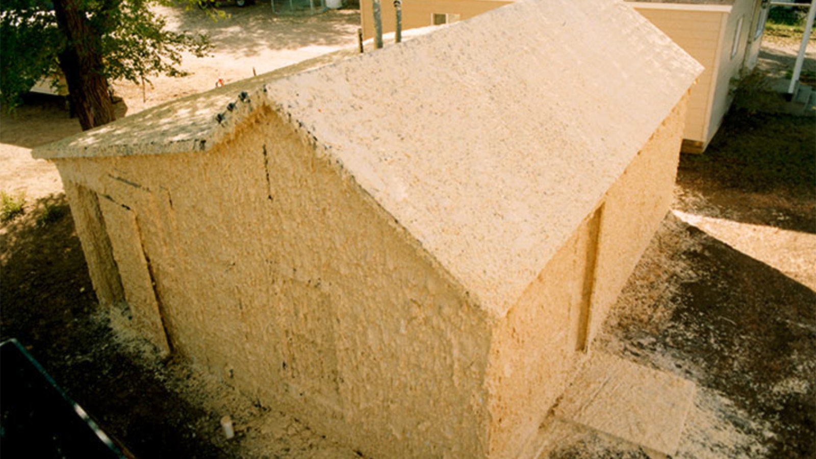 An abandoned house in Powell, Wyoming, was covered in nearly 13,000 pounds of pepper jack cheese by artist Cosimo Cavallero in October 2001.