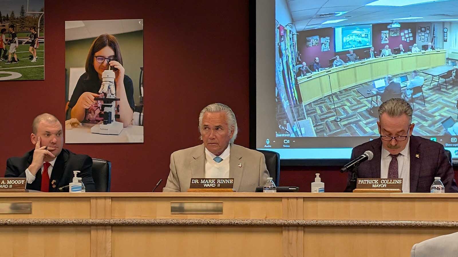 Cheyenne city councilman Mark Moody, from left, Dr. Mark Rine, and Mayor Patrick Collins during Monday's council meeting discussion about the potential impacts of the Chugwater energy project on Cheyenne.