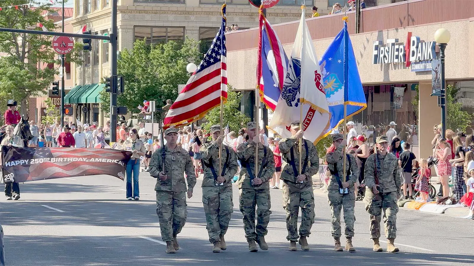 A color guard leads off the Cheyenne 250th Fourth of July Parade on Saturday.
