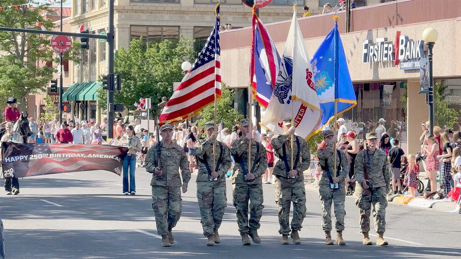 A color guard leads off the Cheyenne 250th Fourth of July Parade on Saturday.