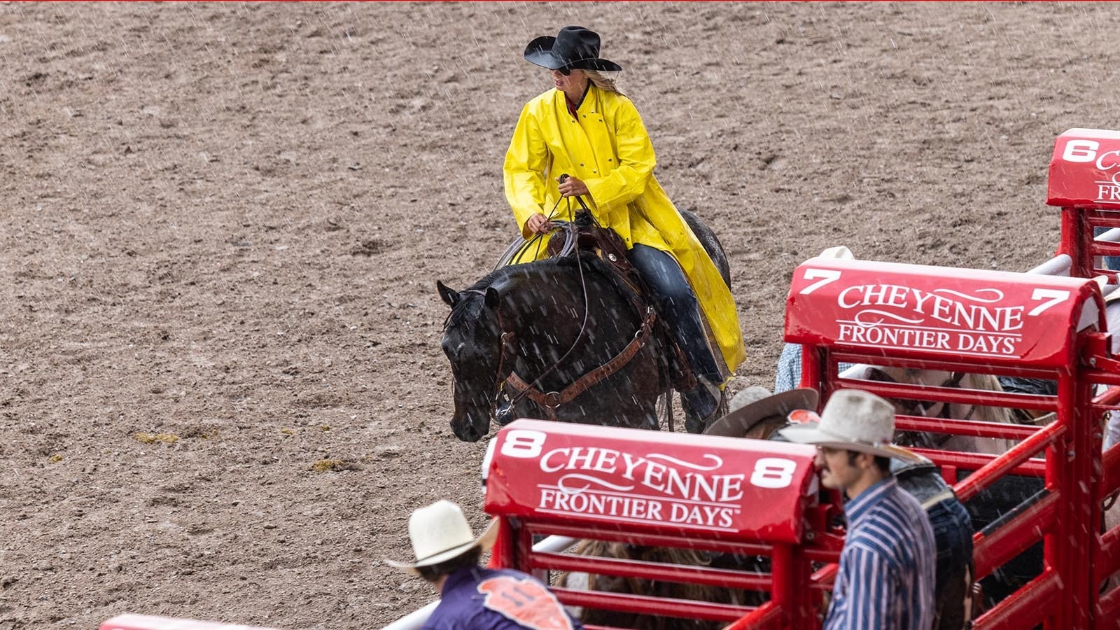 Rain or shine, the show must go on. In this file photo, Kaycee Thomas from Cheyenne volunteers on the CFD Contestant Committee chasing steers out of the arena during a downpour July 26, 2023.