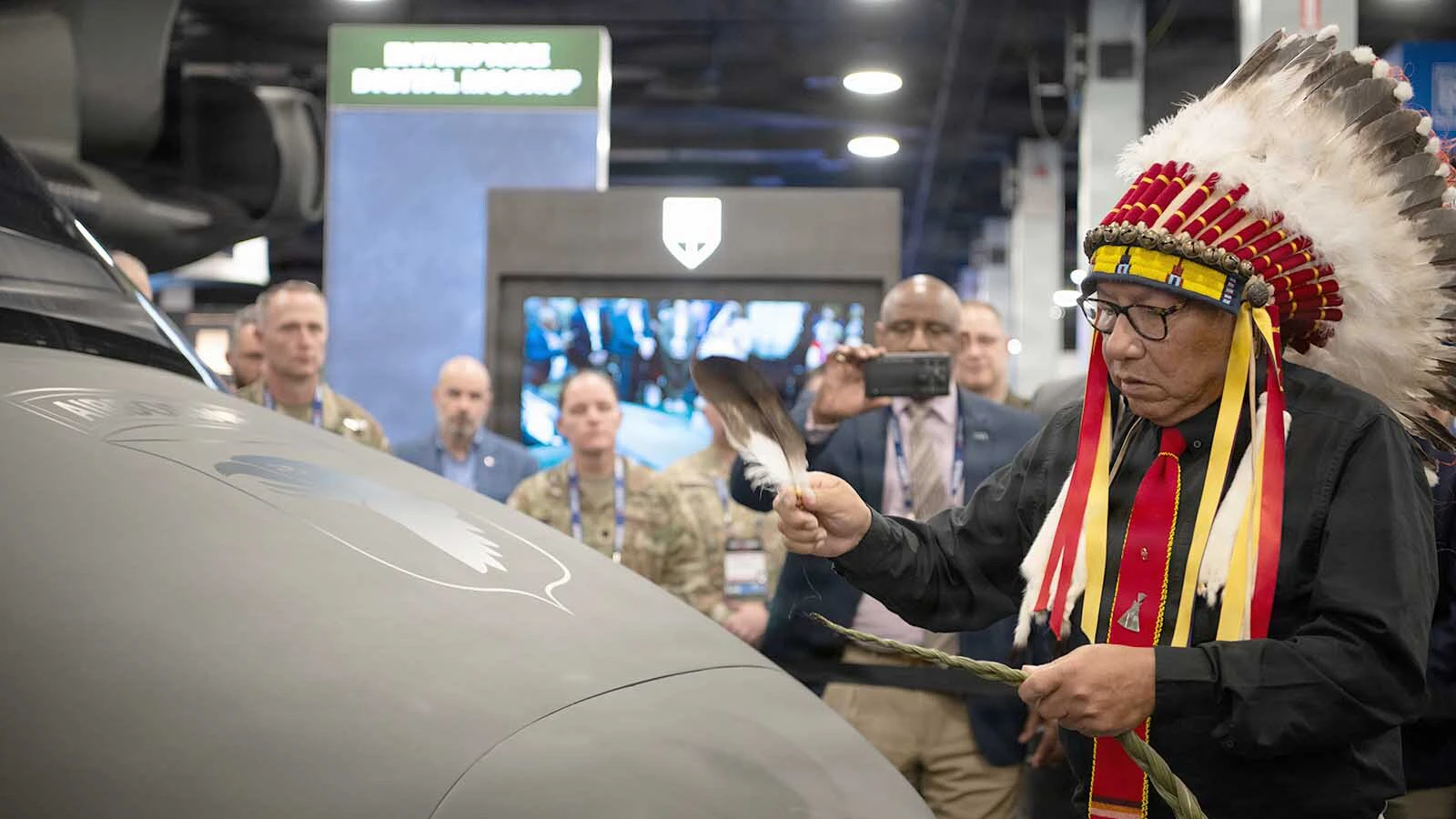 Chief Gordon Yellowman Sr., a Cheyenne tribal historian, performs a traditional smudge during the Cheyenne Tribal visit to the MV-75 Cheyenne II Aircraft unveiling at the Army Aviation Warfighting Summit at the Army Aviation Association of America in Nashville, Tennessee on April 15, 2026.