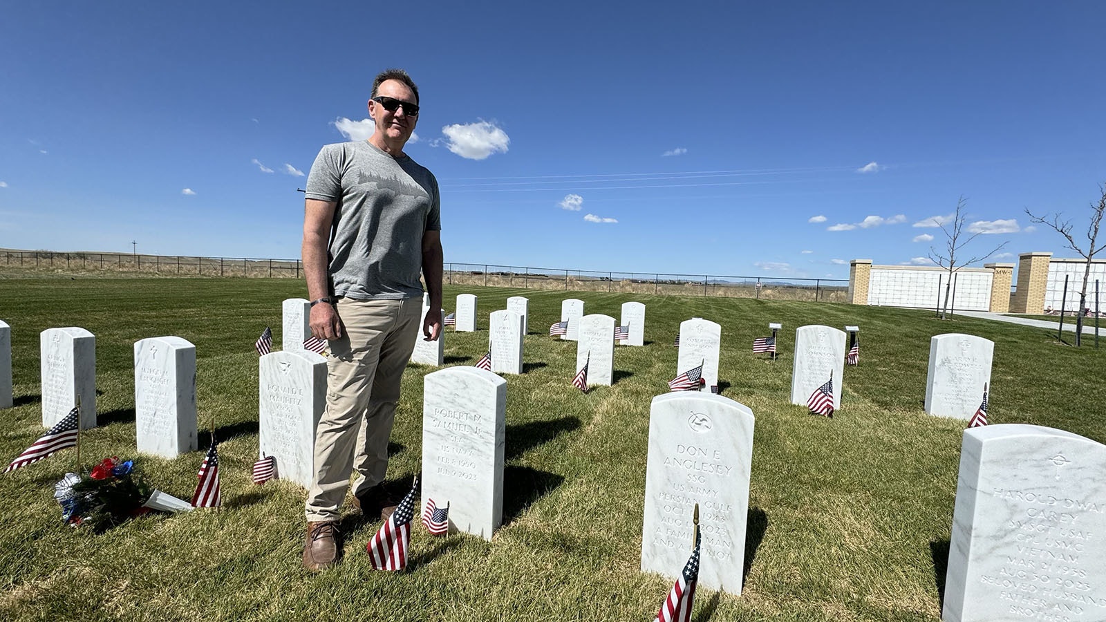 Richard Tygret, 58, showed up at the Cheyenne National Cemetery on Monday to randomly place an American flag on the burial site of a military officer who he doesn’t know.  The deceased person, Robert M. Samuel Jr., served in the Navy, and was buried in the cemetery last July.   He was driving back from a camping weekend at the Vedauwoo recreation area when he felt moved to stop at the cemetery to recognize someone he didn’t know.