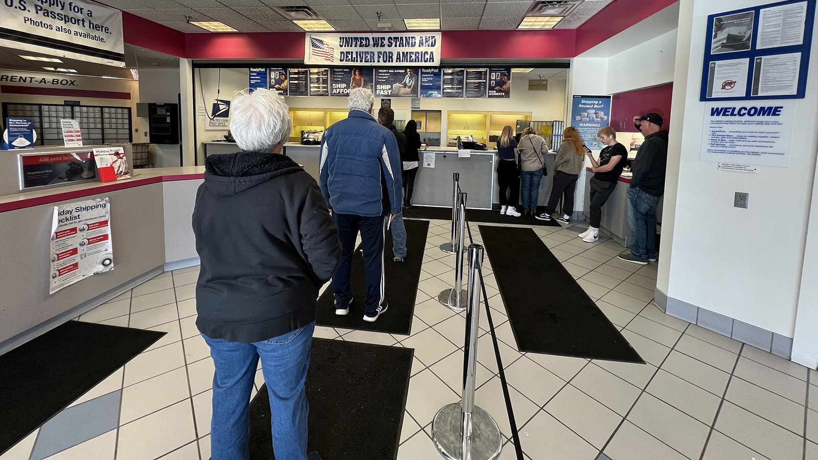 Customers line up in the U.S. Post Office on Converse Avenue in Cheyenne.