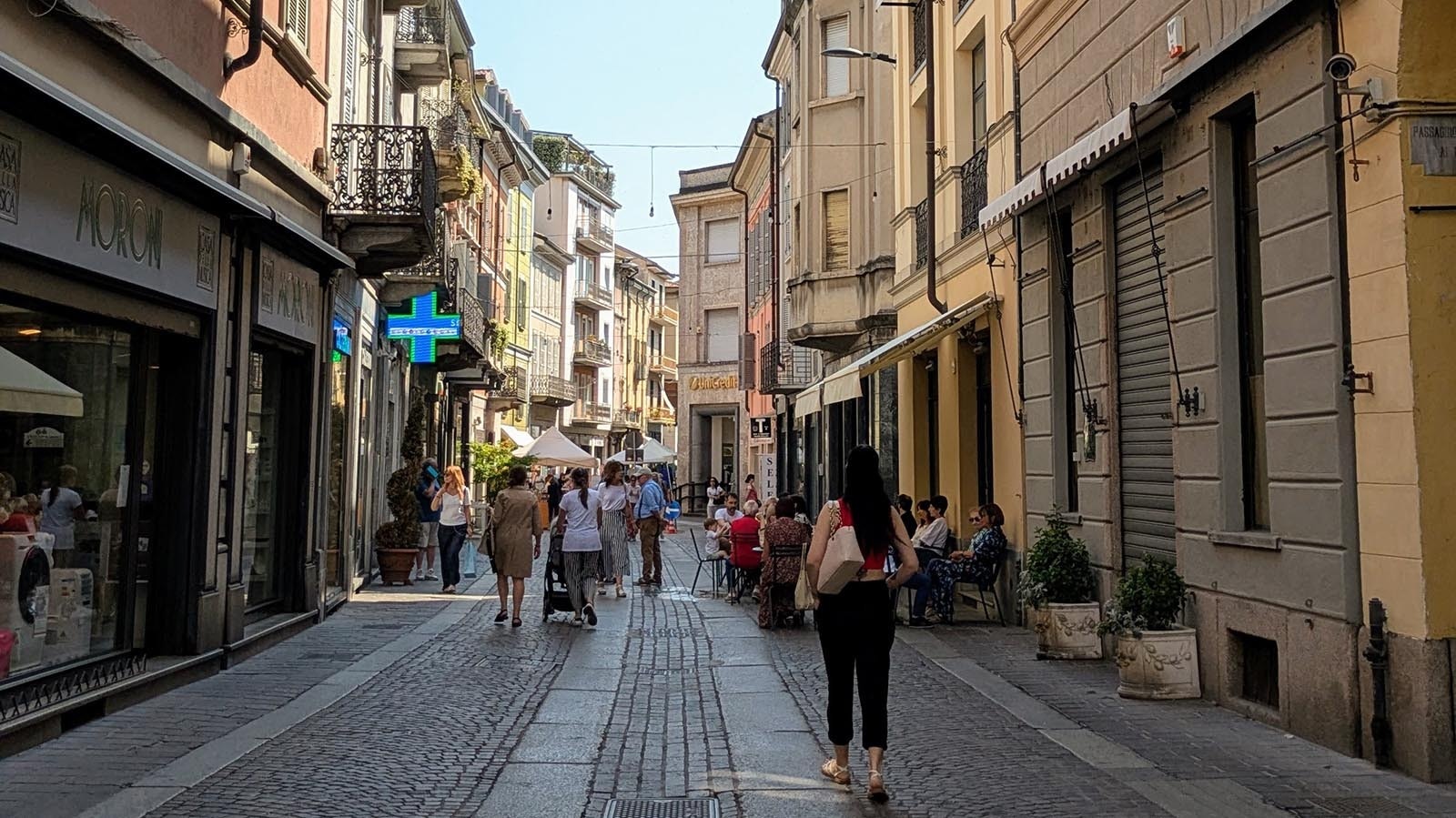 Cafes and shops line the streets near the main square in Voghera, though there are many empty storefronts.
