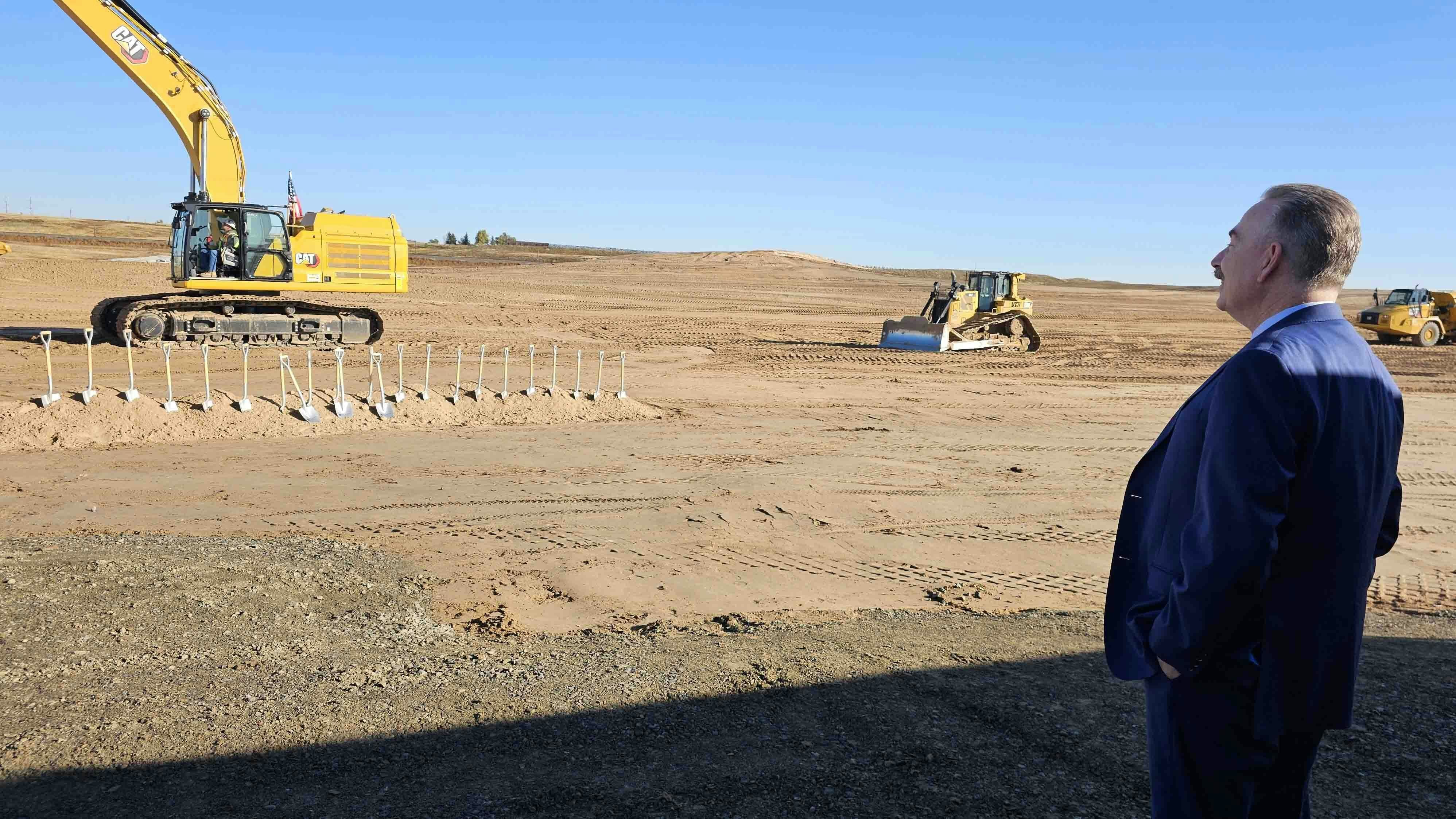 With huge data centers, business parks, and hotels moving forward at what seems lightning-like speed, Cheyenne is being reshaped by a building boom. But there’s nothing sudden about it — this boom has been 40 years in the making. In this file photo, Mayor Patrick Collins overlooks a large solar farm under construciton in south cheyenne.