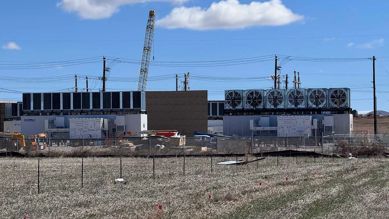 Opposition to data centers is growing more vocal in Cheyenne — and spreading across Wyoming to Evanston and Casper. "It’s very creepy what we put up with now that we said we’d never put up with,” Sen. Cale Case says about the impacts of AI and tech. Above, a small data center under construction in east Cheyenne.
