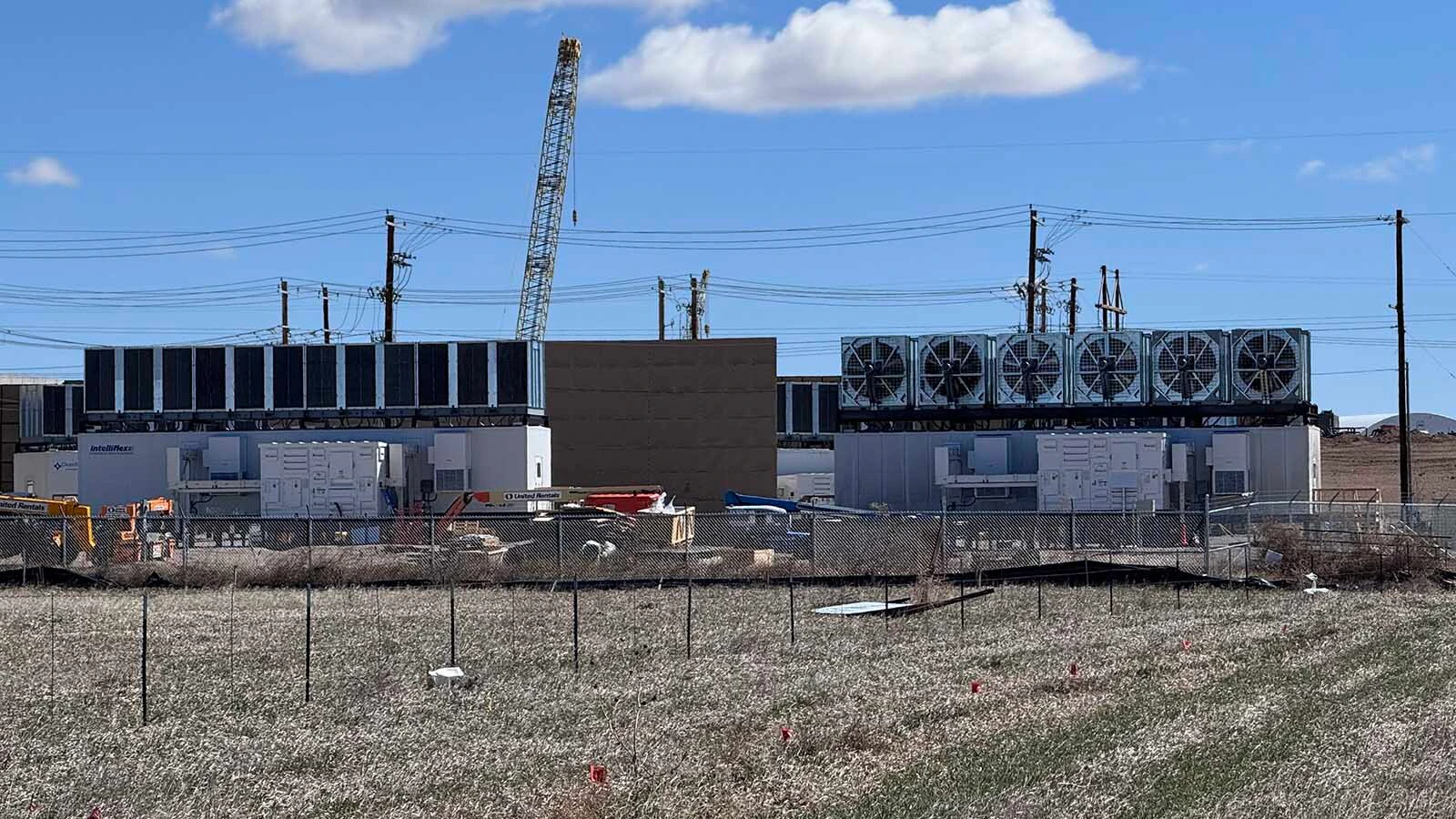 Opposition to data centers is growing more vocal in Cheyenne — and spreading across Wyoming to Evanston and Casper. "It’s very creepy what we put up with now that we said we’d never put up with,” Sen. Cale Case says about the impacts of AI and tech. Above, a small data center under construction in east Cheyenne.