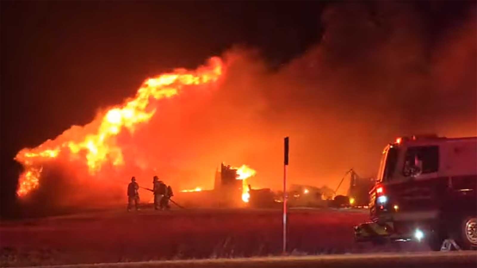 A south Cheyenne family escaped with just the clothes on their backs Tuesday when a fast-moving fire, whipped by strong winds, ripped through their home. The fire also burned three vehicles and all their Christmas presents.