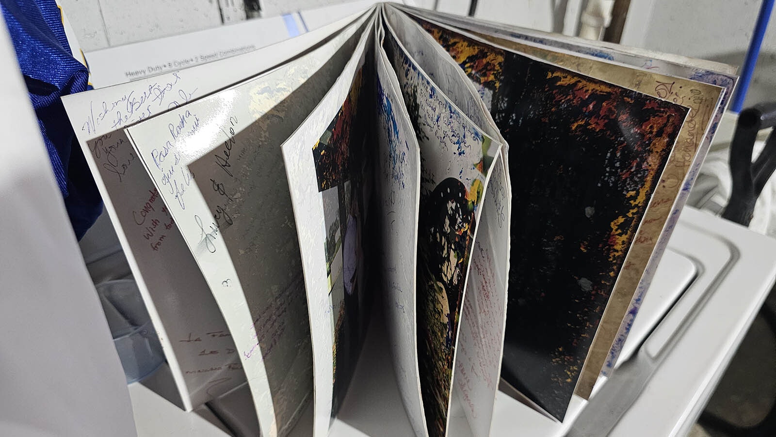 Among the many items in the Rocha-Hernandez household was this wedding album. Many of the pages are sticking together in the aftermath of a flood that filled the couple's basement with 3 feet of water.