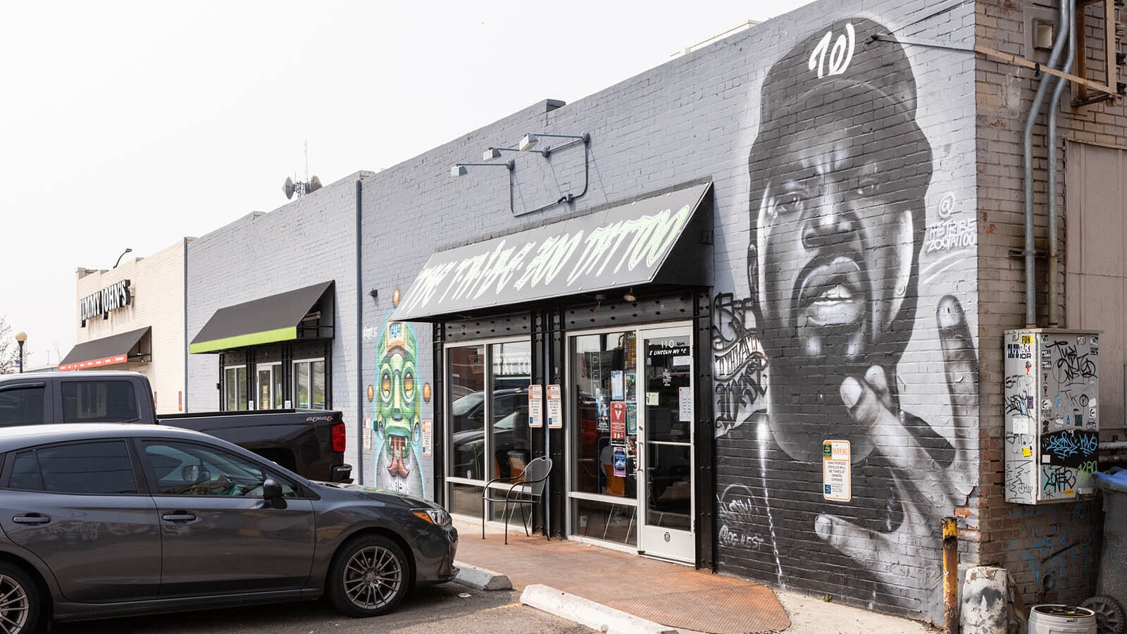 This series of photos show a stunning mural of rapper Ice Cube on the front of the T.R.I.B.E. tattoo shop. Ice Cube performed a sold-out show in Cheyenne in April.