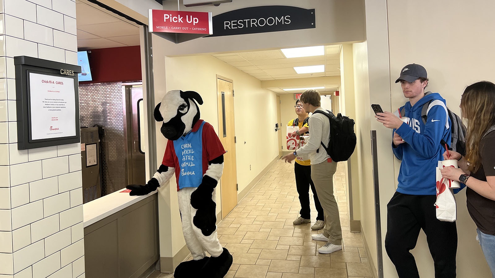 The Chick-fil-A cow mascot was on hand at the University of Wyoming Union Thursday, encouraging people to eat at the newly-opened restaurant there.