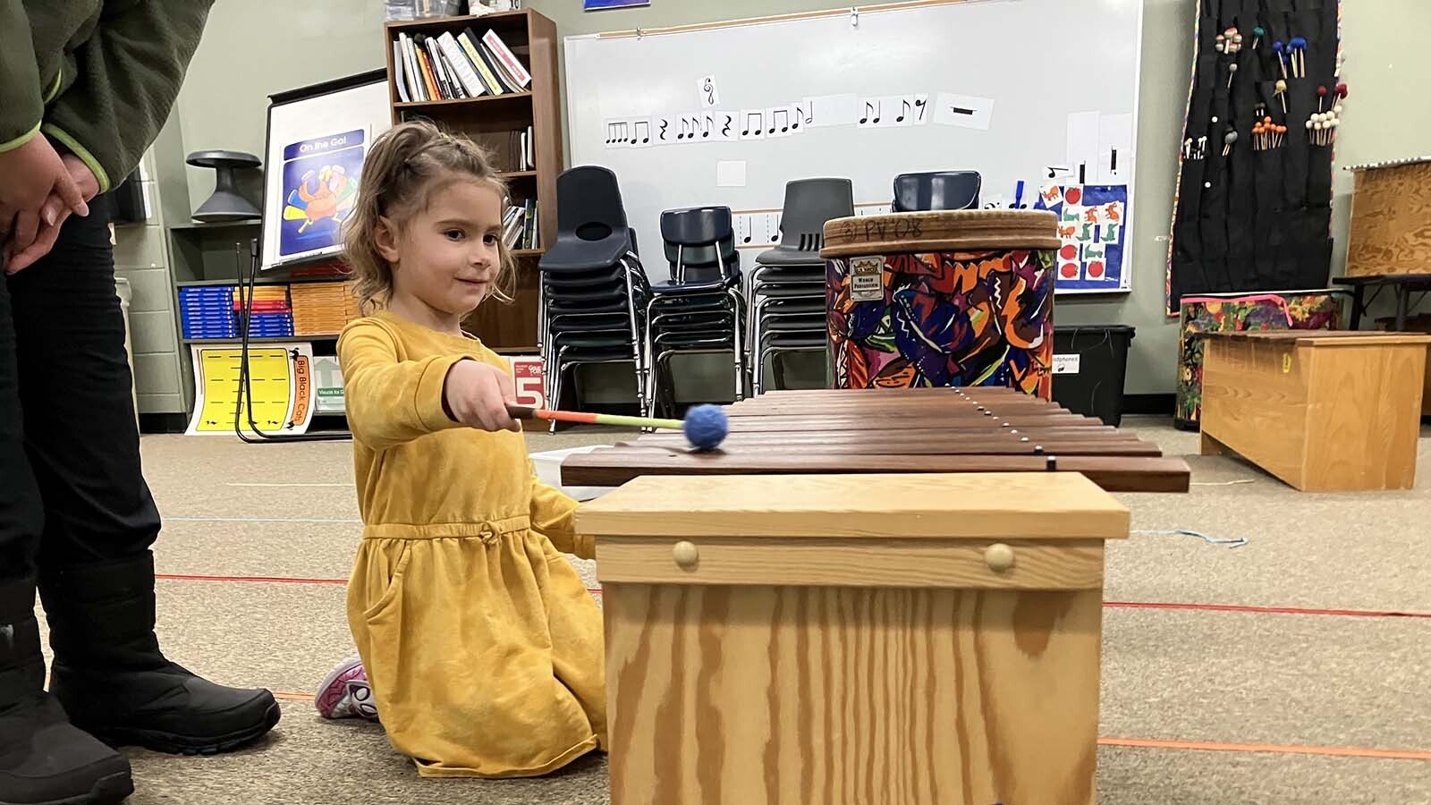 Lyra Capshaw, 4, enjoys watching Chinese programs on YouTube. She checked out the Paradise Elementary’s music room as part of her family’s visit.