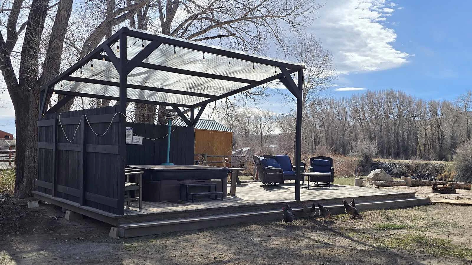 The riverside hot tub awaits at Chinook Winds Lodge.