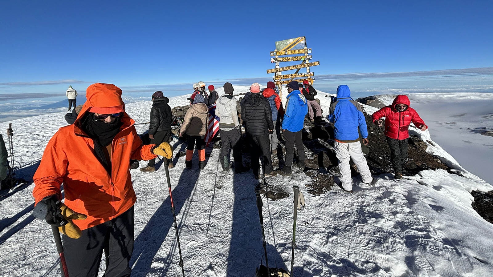 Chris Clifton and his climbing party at the top of Mount Kilimanjaro in Africa.