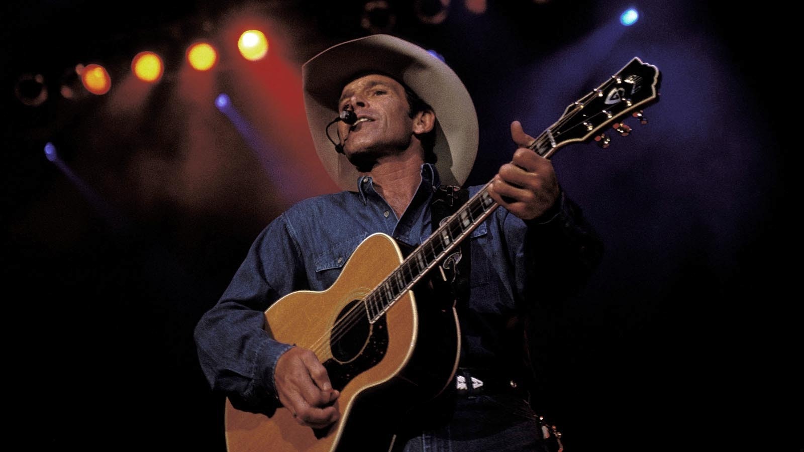 Chris LeDoux performs on state in Nashville, Tennessee, in 1994.