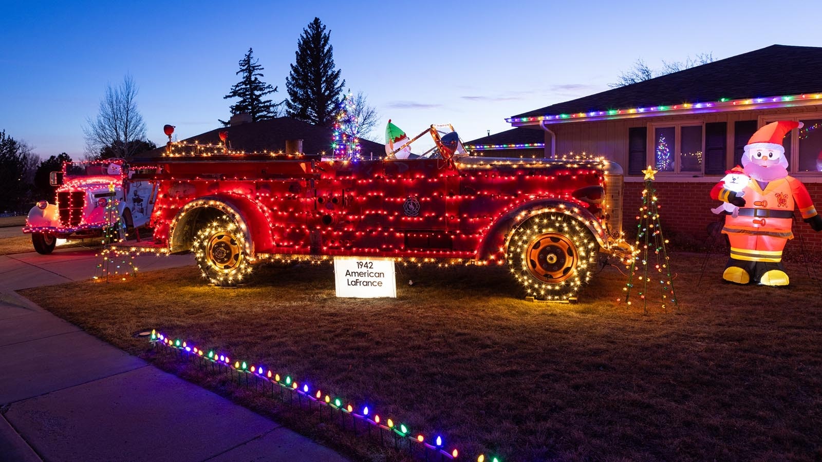 Brian Bartow’s fire truck Christmas light display on Dec. 19, 2024, at 550 Essex Road in Cheyenne, Wyoming.